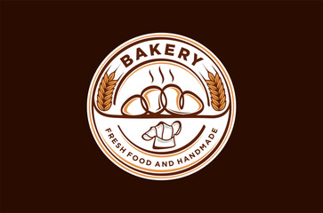 Bakery logo design, featuring a loaf of bread and wheat. Hand-made and delicious. Vector illustration rounded shape.