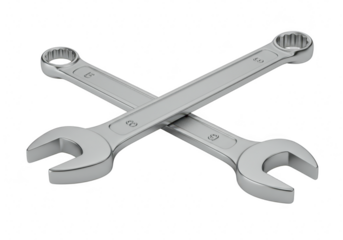 Two shiny chrome combination wrenches crossed diagonally showcasing their open and box ends isolated on a transparent background