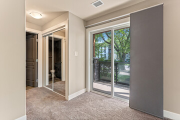 Bedroom with a grey curtain on the door