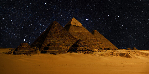 night scene of the castle pyramid in the desert
