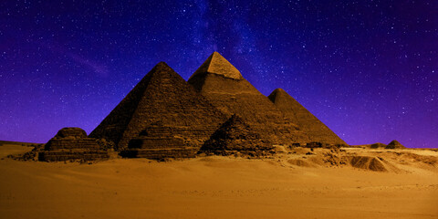 night scene of the castle pyramid in the desert