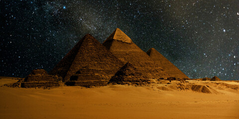 night scene of the castle pyramid in the desert