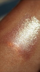 Close up of a person's skin showing irritation and inflammation with a slightly shiny appearance