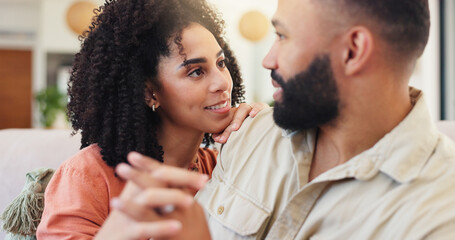 Hug, couple and bonding in lounge, affection or romance in home, smile or relax on weekend or break. Happy, man and woman in living room, embrace and free time in house, relationship or holding hands