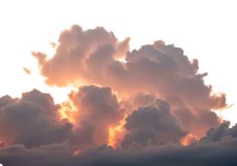 Dramatic clouds illuminated by the setting sun, creating a vibrant orange and pink glow against a dark sky isolated on transparent background