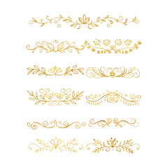 Obraz premium Collection of hand drawn golden text dividers. Calligraphic lines, vintage gold borders and wedding card breaks. Vector isolated flourish ink elements. 