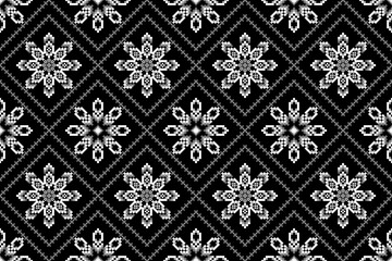 Elegant monochrome black and white ethnic seamless pattern featuring pixelated geometric diamonds and intricate traditional floral motifs. Ideal for modern fashion, textiles, sophisticated backgrounds