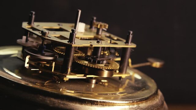 Slide macro shot reveals Brass clock internal mechanical movement