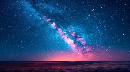 Milky Way arches above a landscape, stars and galaxy hues of pink, purple, and blue dominate night sky