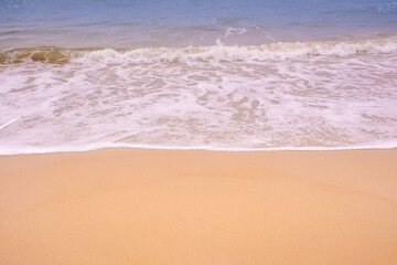Beach sand background for summer vacation concept. Beach nature and summer seawater with sunlight light sandy beach Sparkling sea water 