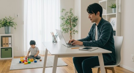 リモートワークと子育てを両立する男性