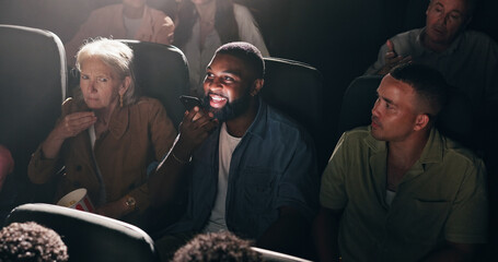 Upset, watching movie and people with man, phone call and frustrated with performance. Audience, crowd and person with smartphone, annoyed and entertainment with argument, speaking and theater