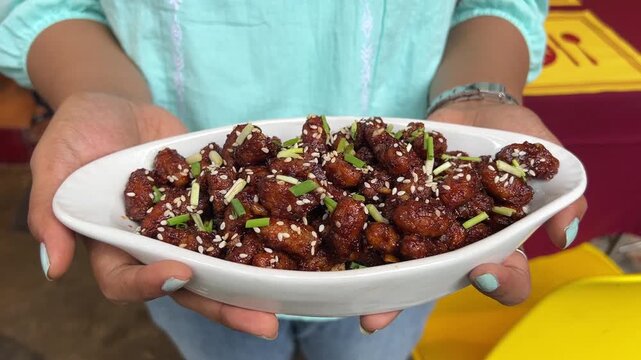 Crispy fried chilly baby corn prepared in Indian style