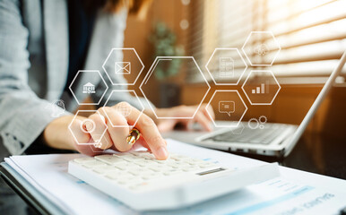 Businesswoman hand working digital marketing media in virtual screen with mobile phone and modern...