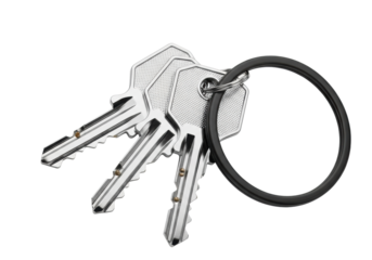 Three polished, highly reflective silver metal keys with intricate laser-cut details on a dark matte black key ring, lying flat on a transparent, isolated background, professional studio product