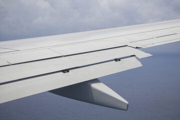 detail of the wing of an airplane with the flaps in motion during the
landing