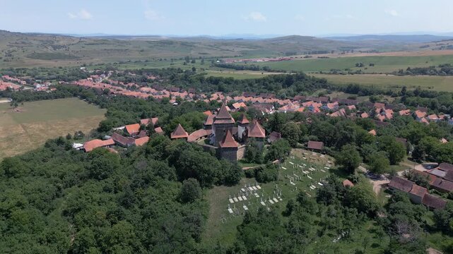 Aerial View of Viscri Village in Transylvania, Romania, with Fortified Church - UNESCO World Heritage Site.