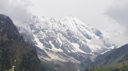 hanuman tibba peak, the beautiful snowcapped peak visible from atal tunnel south portal near...