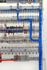View from the back of the electrical panel. Connection of electronic modules using copper...