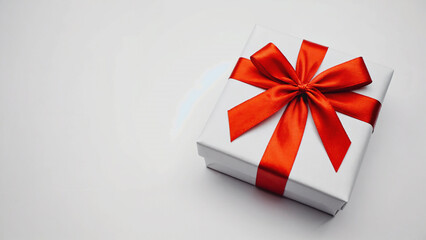 white luxury gift box wrapped with red ribbon on surface.ai 