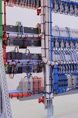 View from the back of the electrical panel. Connection of electronic modules using copper...