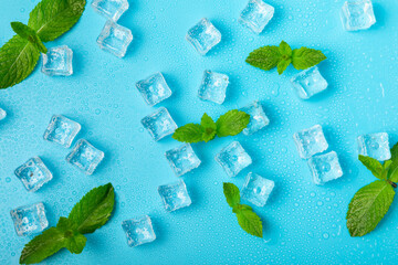 Mint and ice on texture background. Green fresh mint and ice cube. Mint leaves, ice cube and water...