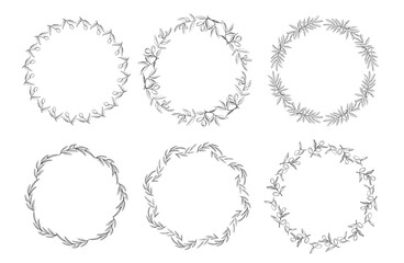 Delicate wreath designs showcasing elegant leaf patterns are arranged in circles. These intricate illustrations can be used for various creative projects or as decorations.