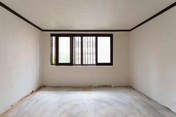 Empty Room with White Walls and Window