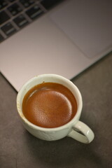 cup of coffee and laptop