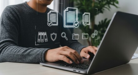 A person works on a laptop with digital documents and business icons floating above