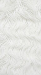 Obraz premium Close-up view of a textured white faux fur fabric.