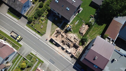Demolition and construction work during the removal of an old building in a village. Heavy...