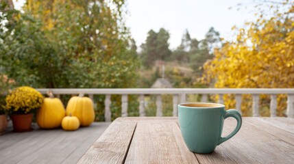 Cozy teal mug amidst golden autumnal symphony, celebrating Samhain spirit and National Pumpkin Day on rustic wooden deck