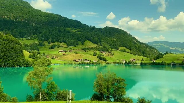 Swiss Village countryside with a lake in Switzerland