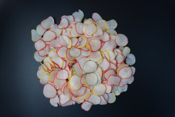 Thinly sliced, dried raw crackers ready to be fried