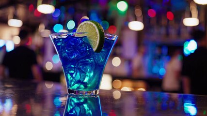 Vibrant Blue Cocktail with Lime Slice Perfect for HighEnergy, Summer Campaigns, Inspiring Fun and Energy Boost.