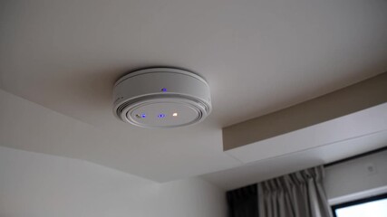 Modern Fire Alarm Glowing Ceiling Light, Minimalistic Design for TechFocused Campaigns, Inspires a Sense of Safety and Innovation.