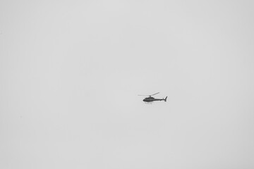 helicopter flying over water