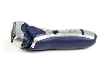 Electric razor. A battery-powered razor on a white background.