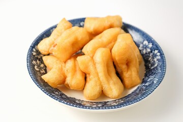 chinese donut, youtiao, chinese breadstick on white background,thai called patongo