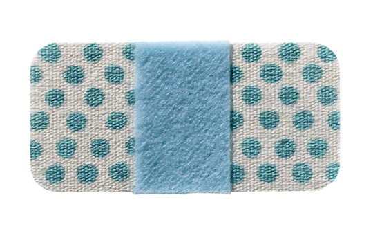 Close-up of a teal polka dot bandage.