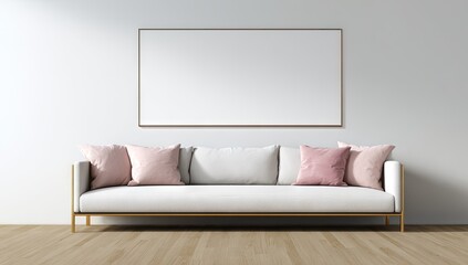 Empty framed art piece above a white sofa with rose-colored accent pillows.
