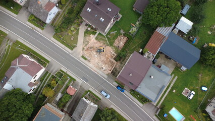 Demolition and construction work during the removal of an old building in a village. Heavy...