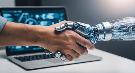 Man's hand shakes cyborg's hand, human-artificial intelligence interaction through laptop screen. Future artificial intelligence of robots and cyborgs. Research on artificial intelligence of robot 