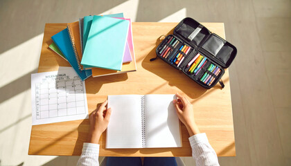 Student's Desk: Blank Notebook, Colors, and Planner