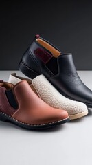 Elegant men's casual slip-on shoes in black, brown, and white on display