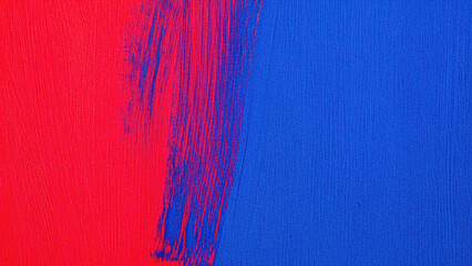 Red and blue paint collide in a vibrant abstract background. Perfect for web design, marketing materials, or creative projects.