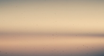 Soft, muted colors and subtle dust particles create a hazy, atmospheric effect.