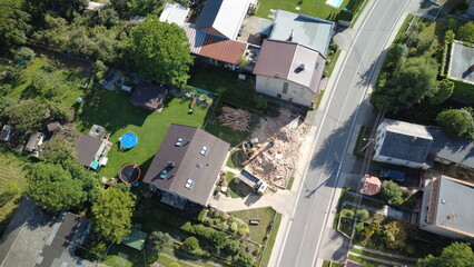 Demolition and construction work during the removal of an old building in a village. Heavy...