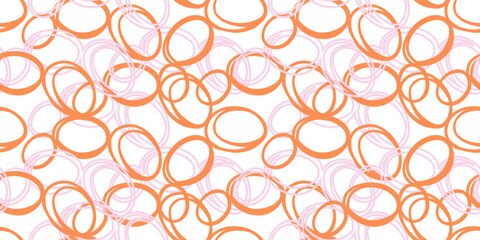 Seamless abstract pattern of overlapping hand drawn circles in orange and pink tones on a white  background. Plain ornament for modern fabrics, home decor, wallpapers, and graphic design projects.